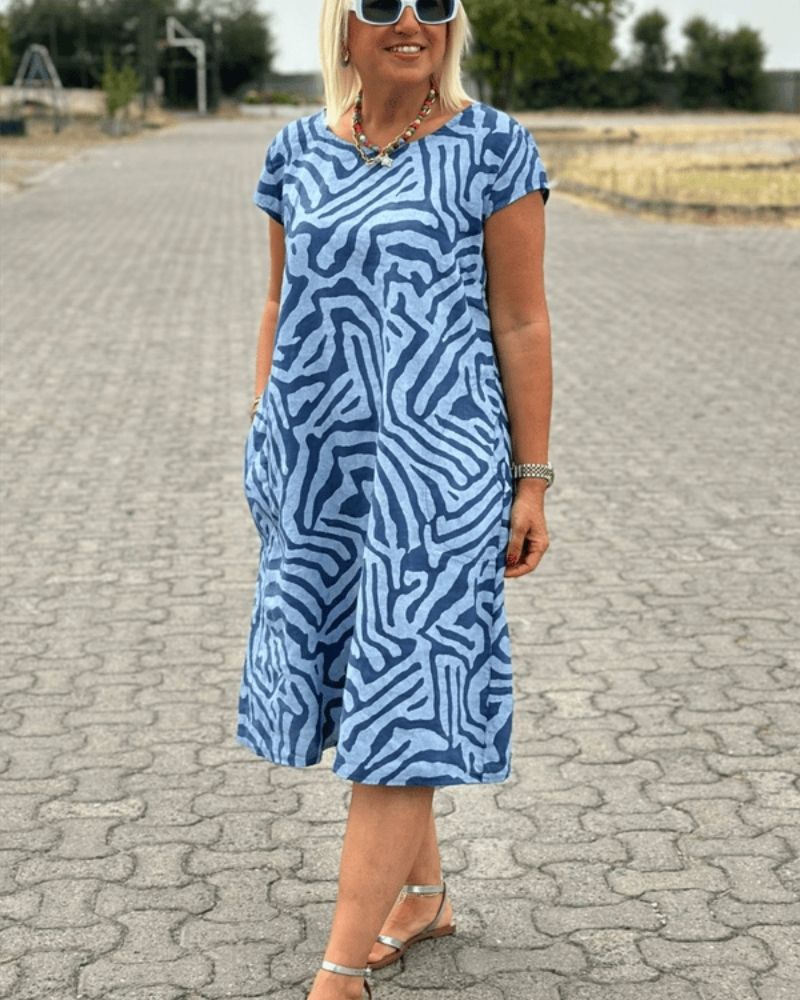 Anouk | Zomerjurk met Ronde Hals en Vrouwelijke Zebra-Print