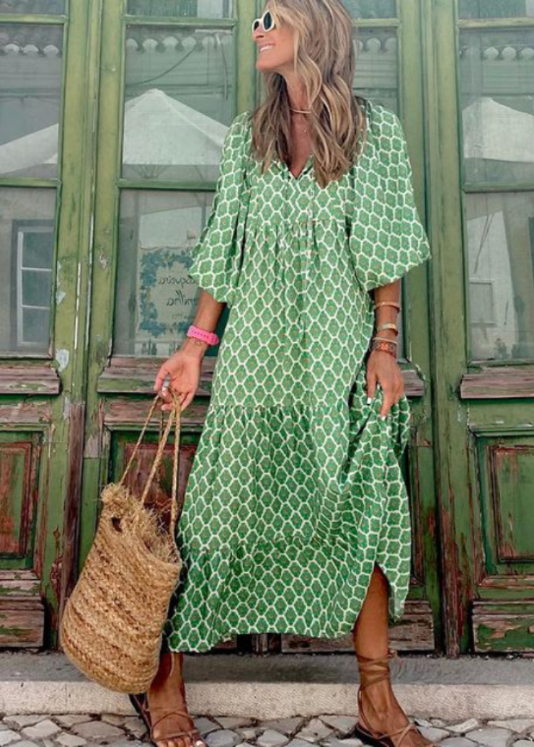 Sharon | Elegante jurk met print